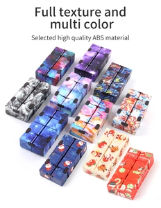 Detailed view of high quality ABS infinity cubes in diverse galaxy and holiday patterns