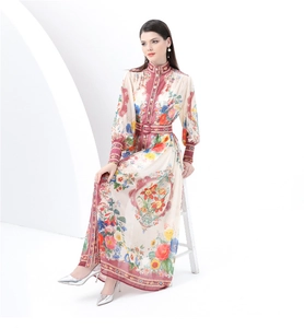 Detail of vintage floral print maxi dress featuring stand collar and lantern sleeves