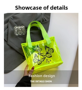Detail of neon green transparent PVC tote bag with stylish black butterfly patterns