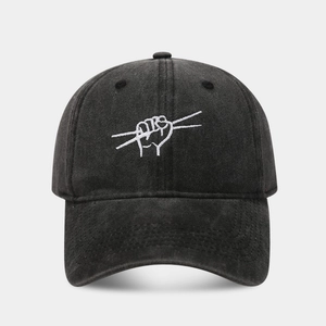 Vintage washed black baseball cap with drum gesture embroidery in hip hop street style