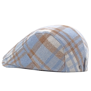 Side view of men's tweed flat cap showing plaid texture and metal rivet detail