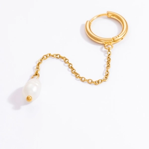 Detail of 18k gold plated earring featuring a delicate chain and natural freshwater pearl