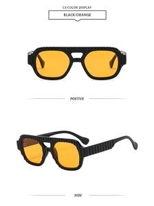 Detail view of black ribbed frame sunglasses with vibrant orange lenses from two angles