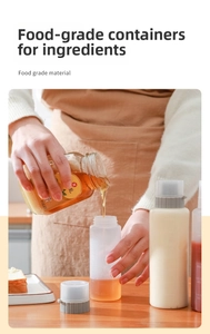 Detailed scale view of a 150ml clear plastic sauce bottle with honey pouring inside