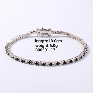 Detail showing 18.0cm length and 6.0g weight of black and white tennis bracelet