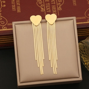 Elegant gold heart-shaped long tassel earrings made of stainless steel in a gift box