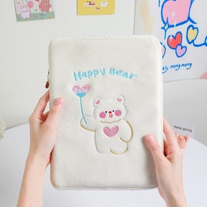 Close-up of white plush iPad sleeve with bear embroidery and zip closure detail
