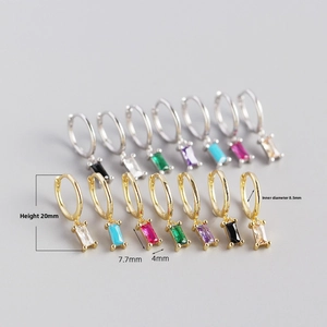 Detail showing 20mm drop earrings with rectangular colorful zircons in gold and silver