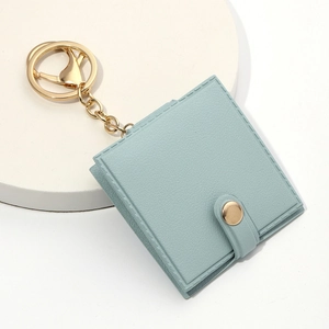 Mini specchio da trucco quadrato portatile in pelle PU azzurra con bottone dorato