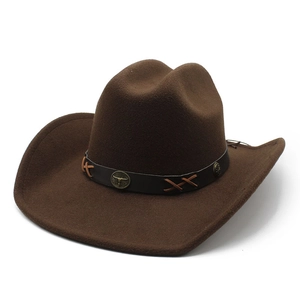 Dark brown felt western cowboy hat with wide brim and bronze bull head metal logo
