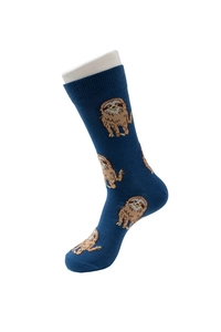 Detailed view of blue cotton socks featuring cute brown cartoon sloth patterns on foot model