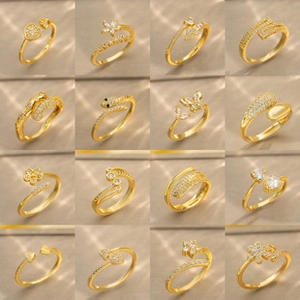Set van zestien gouden verstelbare ringen met hart-, bloem- en slangmotieven