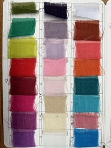 Color chart showing 24 different shades of lightweight voile fabric for table runners