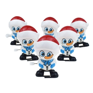 Set of six clockwork wind-up walking snowman toys with red hats and blue scarves