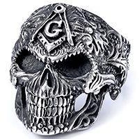 Macro view of retro skull ring in antique silver finish with Masonic G symbol