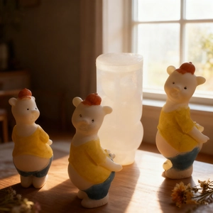 DIY silicone mold for cute cartoon bear candles and handmade plaster ornaments in hats