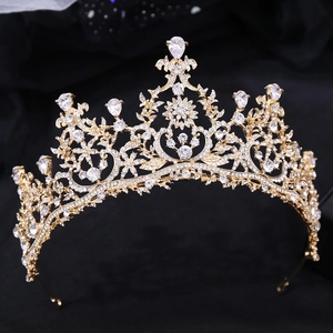 Macro shot of gold bridal crown detailing AAA zircon and teardrop crystal settings