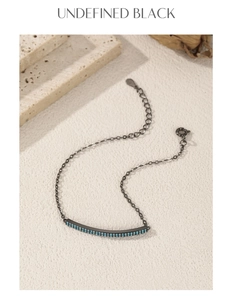 Detail of S925 black chain bracelet with turquoise stone inlay and adjustable clasp