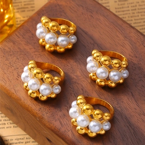 Three-layer gold hollow beaded ring with white pearls in elegant vintage style