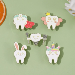 Set of 5 cartoon tooth enamel pins including dentist and tooth fairy designs for bags