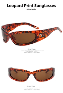 Macro view of leopard print frame sunglasses with silver moon emblem on side temples