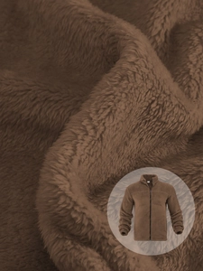 Detailed macro view of brown polar fleece fabric texture on a stand-collar zip jacket