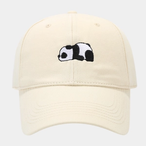 Close-up of cute panda embroidery on a cream cotton baseball cap with twill texture