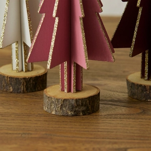 Mini wooden Christmas trees in white, pink and red with golden glitter and bark base