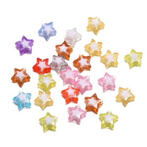 Macro shot of colorful acrylic star beads with white inner core for DIY crafts