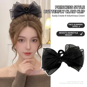 Large black tulle mesh bow hair claw clip for elegant princess style hairstyles