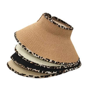 Straw visor hat with leopard trim and bow, available in khaki, white, black, and beige colors