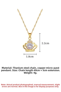 Macro view of gold crown pendant with sparkling crystals and titanium steel chain