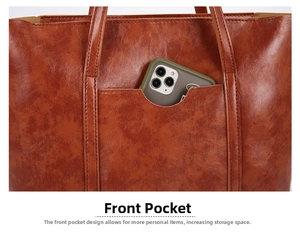 Detail of front slip pocket on brown faux leather bag with smartphone for size reference