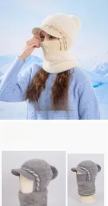 Macro detail of winter fleece-lined knit hat featuring integrated warm face mask and neck cover