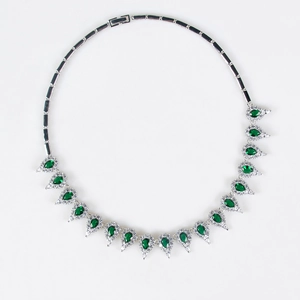 Elegant silver bridal jewelry set with pear-cut green gemstones and crystal necklace