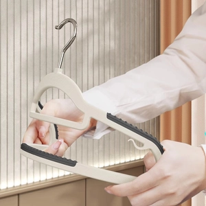 Non-slip plastic clothes hanger with rotating metal hook and anti-shoulder bump design