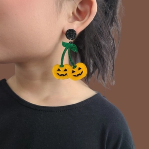 Glittery Jack-O-Lantern pumpkin earrings for Halloween featuring yellow and green glitter