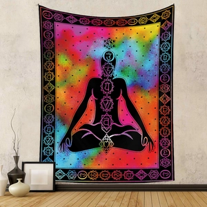 Detail of meditation tapestry featuring chakra symbols on a colorful nebula background