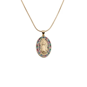 Gold oval pendant necklace featuring central figure engraving and colorful gemstones