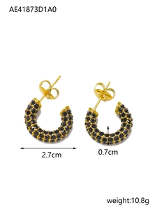 Macro shot of 2.7cm gold C-shaped earrings with dense black zircons and dimensions