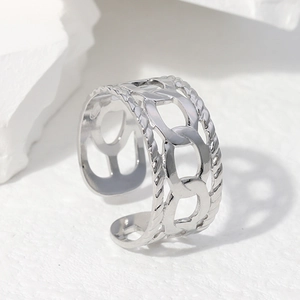 Silver stainless steel open ring featuring a modern hollow chain design on marble