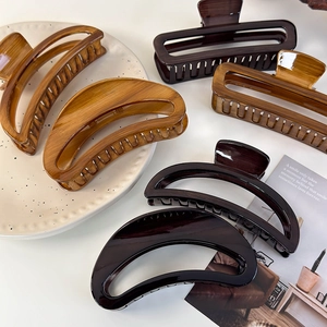 French vintage crescent hollow claw clips in tortoiseshell acrylic and wood grain finish