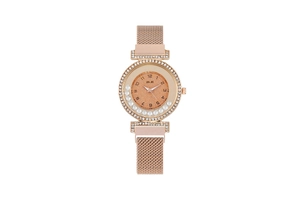 Detail of rose gold watch featuring a flowing crystal dial and Milanese mesh strap