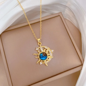 Luxury gold star and moon necklace with blue celestial gemstone and sparkling crystals