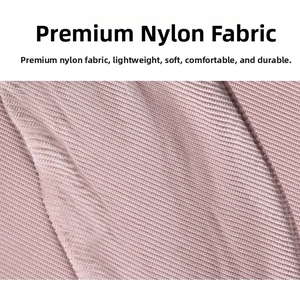 Detail of lightweight pink-purple nylon fabric showing soft texture and durability
