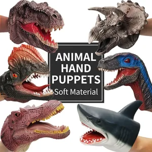 Set of realistic soft rubber dinosaur hand puppets including T-Rex and Shark for kids