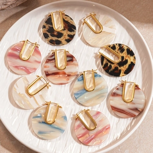 Set of round acetate hoop earrings with 18k gold plating in various marble patterns