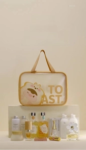 Detail view of a yellow waterproof cartoon toast wash bag with a large capacity zipper
