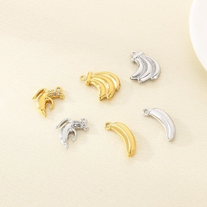 Gold and silver hollow banana charms for DIY jewelry making in various designs