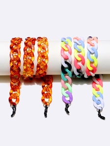 Detail of colorful macaron and amber acrylic eyeglass chains with non-slip rubber loops